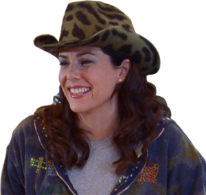 Lorelai smiles while wearing a blue, rhinestone-decorated hoodie and an animal-print cowboy hat with a curved brim.