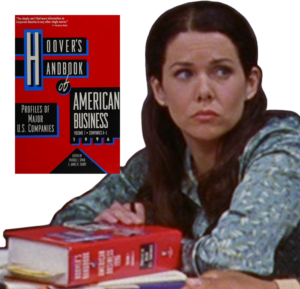 A discouraged Lorelai sits in front of a thick, closed book with a bright red cover. Inset image shows book cover.